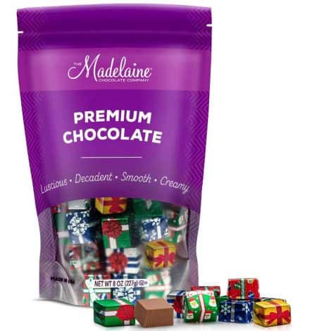 Half Pound of Madelaine Solid Premium Milk Chocolate Presents, Wrapped in Italian Foils with Assorted Designs.