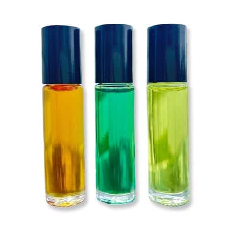 Three fragrances for men in a set of body oils, perfect travel size gift.