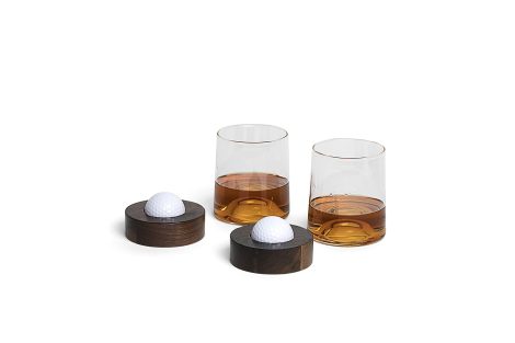 Golf-themed coasters and whiskey glasses, perfect for golf enthusiasts who enjoy a drink. Great gift idea!