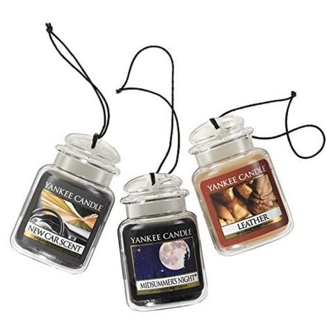 Yankee Candle Car Air Fresheners – Car Jar® Ultimate 3-Pack. Eliminates odors for 30 days. Includes Leather, Midsummer’s Night, & New Car.