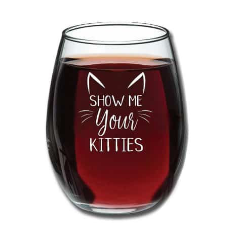 Check out the “Show Me Your Kitties” wine glass – a hilarious gift for cat lovers. Perfect for birthdays and holidays.