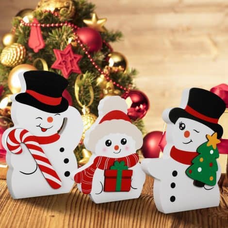 Set of 3 adorable, festive winter decor pieces featuring a cute snowman, candy canes, and gift box sign.