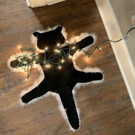 Aunt Bethany’s Funny Christmas Rug: Warmly Lit Fried Cat Carpet – A Hilarious National Lampoon Decoration!