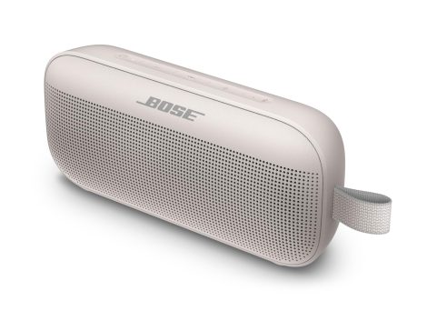 White Bose SoundLink Flex: Portable, waterproof Bluetooth speaker with microphone for travel, outdoor activities, and pool parties.