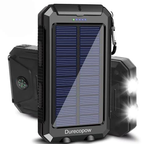 Black Solar Power Bank: Ultra-portable, waterproof charger for outdoor activities with dual USB ports and flashlight.