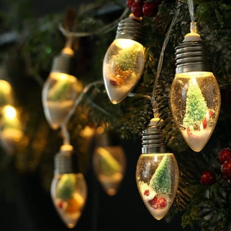 Experience the festive spirit with the JUSTOTRY 2PC 6.6ft Christmas Lights. Illuminate your space with charming Globe Bulbs and ornaments.