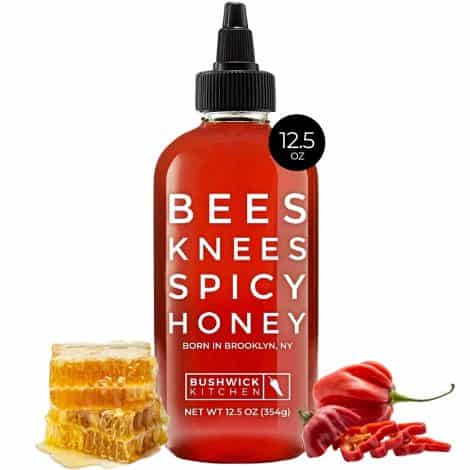 Spice up your taste buds with 12.5 oz of Bees Knees Spicy Honey, a gluten-free and Paleo-friendly hot sauce. Perfect for food gifting!