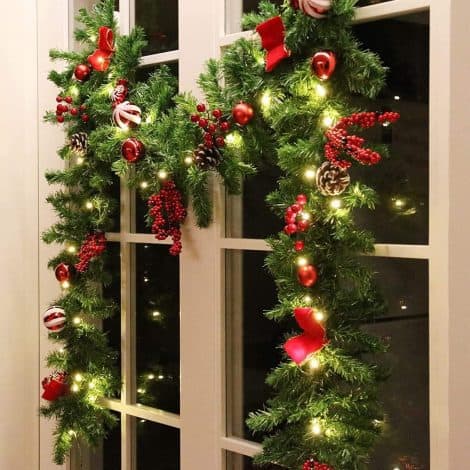 MorTime 9 FT Festive LED Christmas Garland adorned with pinecones, berries, bows, balls, candies & 50 warm lights.