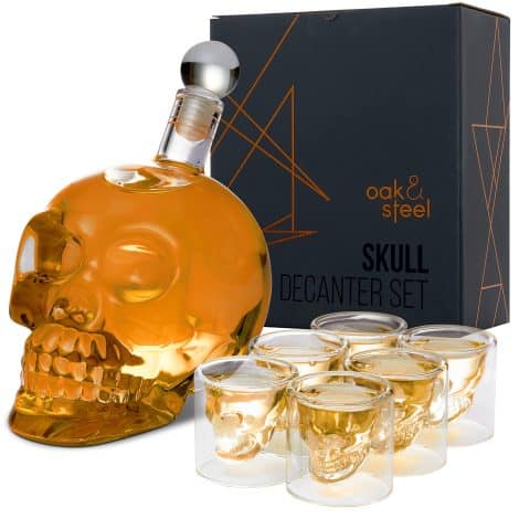 Introducing the Oak & Steel Skull Decanter Set: 25oz/ 700ml decanter with 6 unique glasses, perfect for alcohol enthusiasts.