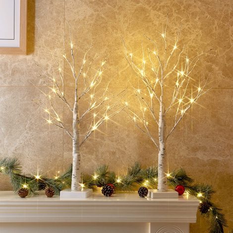 2-Pack PEIDUO LED Birch Tree Lights: Festive indoor Christmas decor with warm white fairy lights. Battery-operated, with timer.