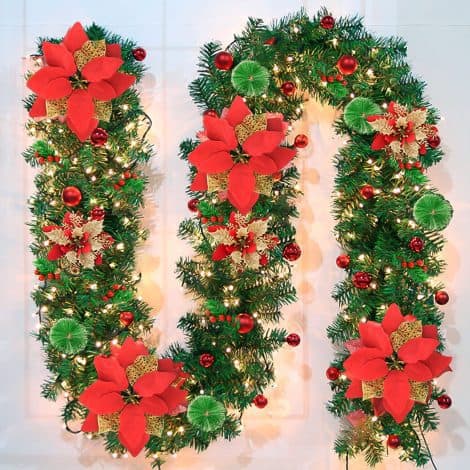 9Ft Green Pre-Lit Christmas Garland – Festively adorned with red flowers, balls, berries, snowy pine – perfect for your home.