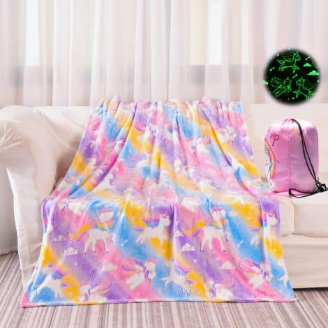 Glow-in-the-dark Unicorn Blanket, a soft and pink gift perfect for girls’ birthdays. Measures 50”x60”.