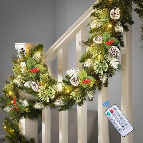 9-foot prelit Christmas garland with color-changing lights, timer, remote control, and battery operation for indoor/outdoor decoration.