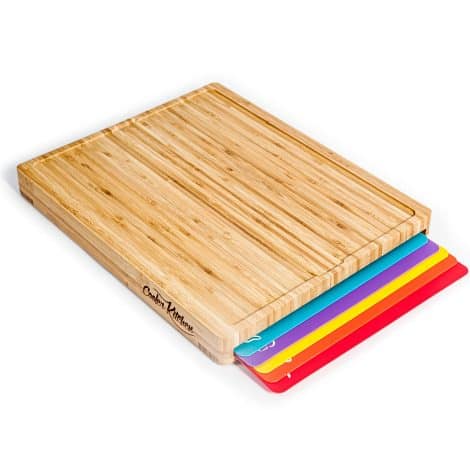 Easy-to-clean bamboo cutting board set with 6 color-coded flexible mats featuring food icons for chopping.