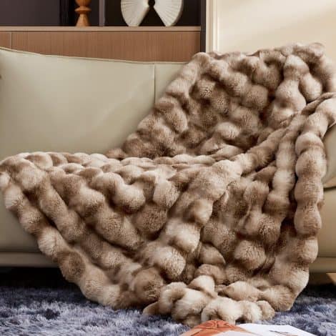 Luxurious, ultra-plush Touchat Faux Rabbit Fur Throw Blanket provides ultimate warmth and coziness for your home.