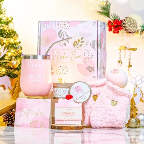 Luxurious Christmas spa set for women including tumbler and pink gifts perfect for Secret Santa or stocking stuffers.