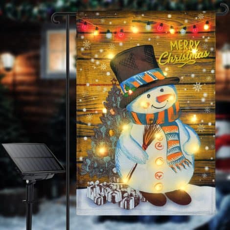 “Nevirige Illuminated Winter Garden Flag: Solar-Powered Christmas Flag with LED Snowman for Outdoor Decoration.”