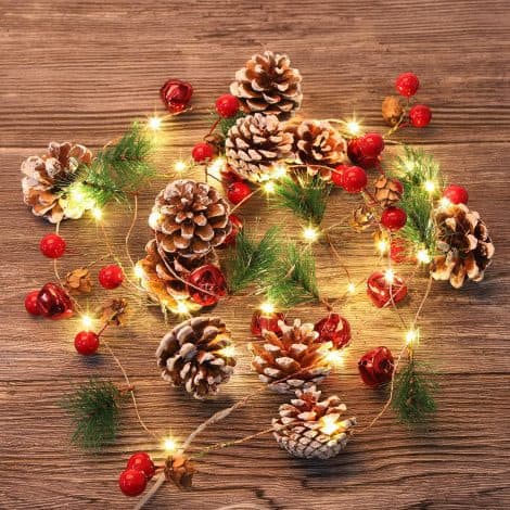 10.3 Ft LED Christmas garland with lights, featuring red berries and pine cones, perfect for indoor holiday decor.